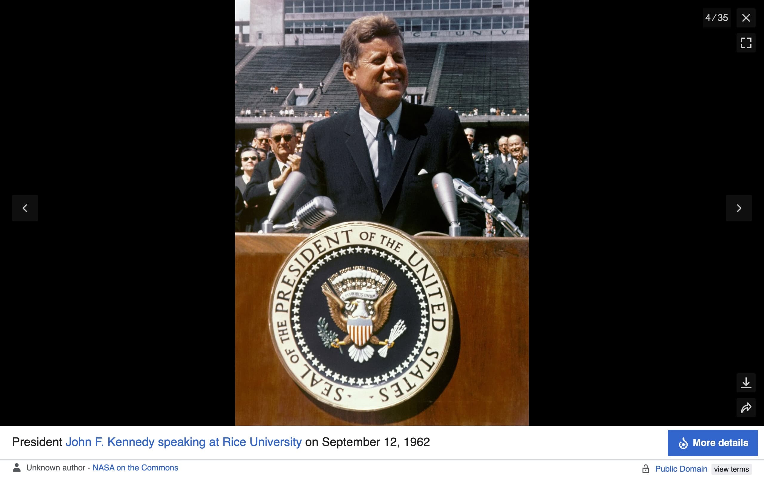 Wikipedia's MediaViewer open on the Apollo 11 article, showing a photo of President Kennedy speaking at Rice University in 1962, with a 4 of 35 counter, previous and next arrows, a caption bar and a More details button