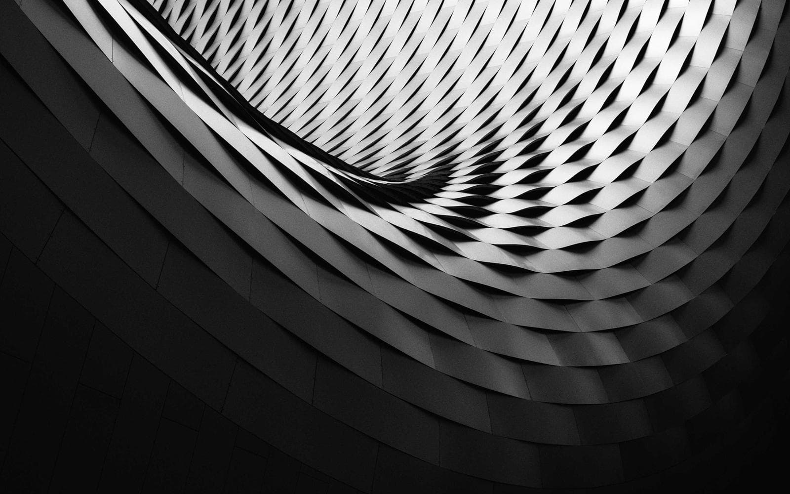Curved building facade in black and white